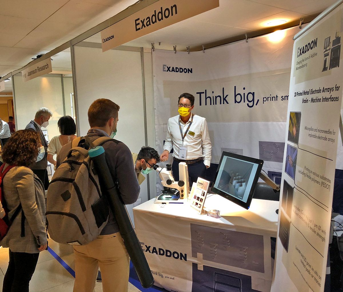 CEO Edgar Hepp speaking to visitors at the Exaddon booth at Micro Nano Engineering Conference 2021