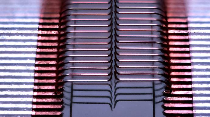 An optical micrograph of a demonstrator array for probe testing microLEDs, 3D printed with Exaddon's technology.